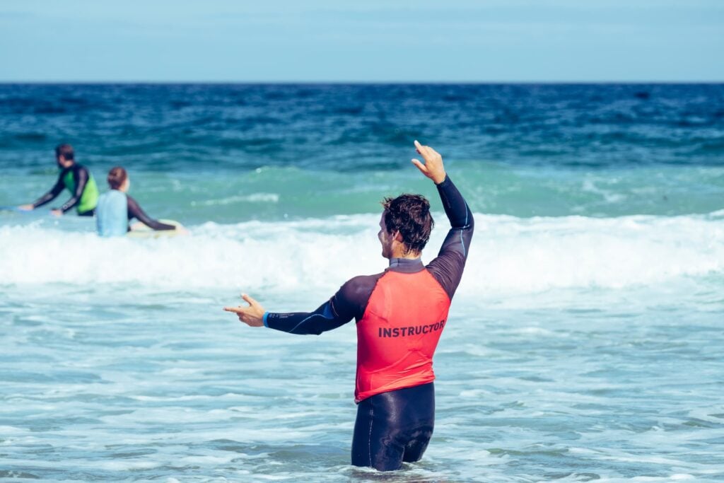 surf instructor of our surf school in portugal while teaching the beginner classes